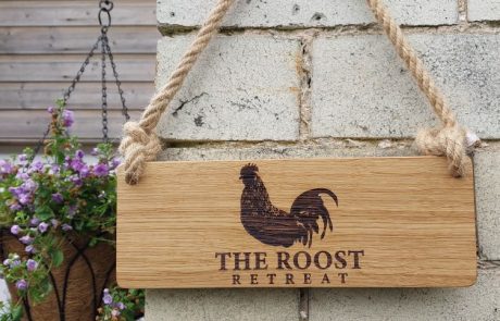 The-Roost-Retreat-Sign